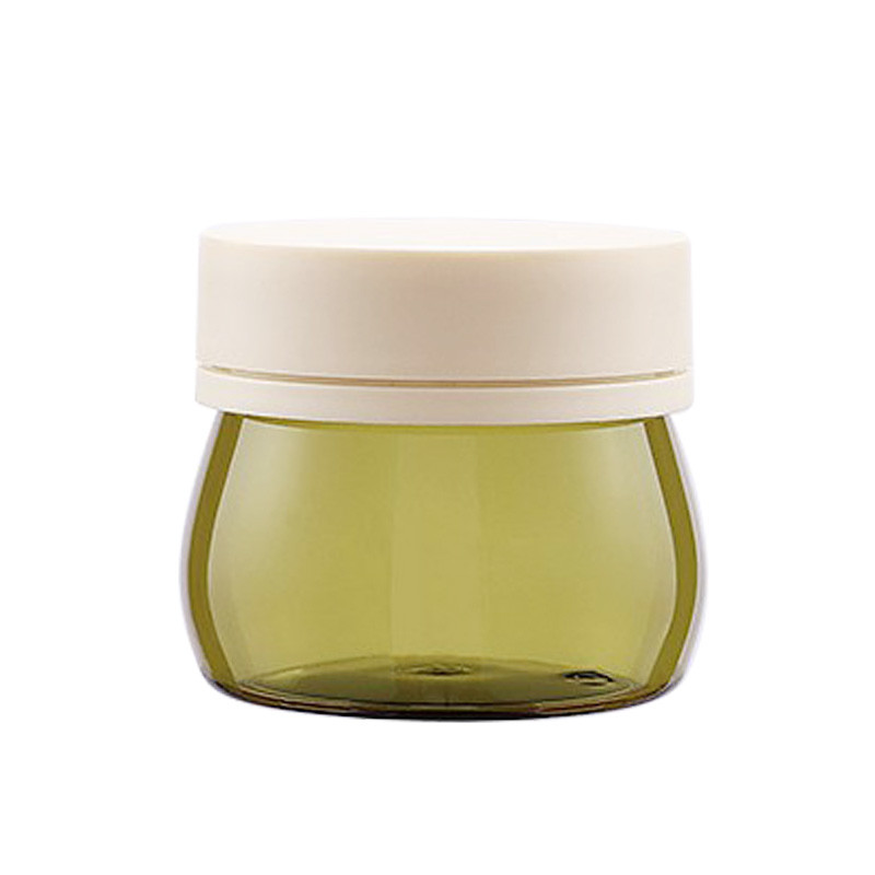 China 30g 50g 80g 100g Cosmetic Clear Green Glass Jar With Plastic Lid For Body Cream wholesale