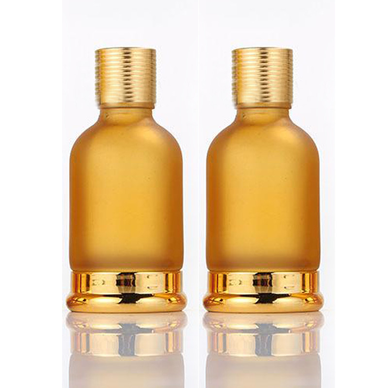 China Luxury Gold Dropper Frosted Glass Essential Oil Bottle Round Shape wholesale
