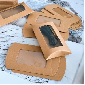 China Creative Pillow Shaped Kraft Paper Boxes with Window Candy Packaging wholesale