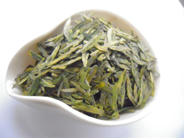 Quality Curved Shape lung ching dragonwell green tea Fresh Tea Leaf material for sale