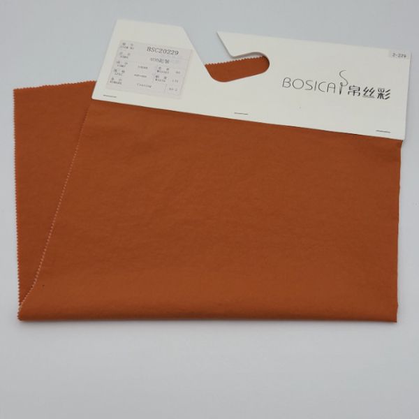 China 40D PU Coating Puffer Jacket Fabric Nylon Washing Crepe Fabric on sale