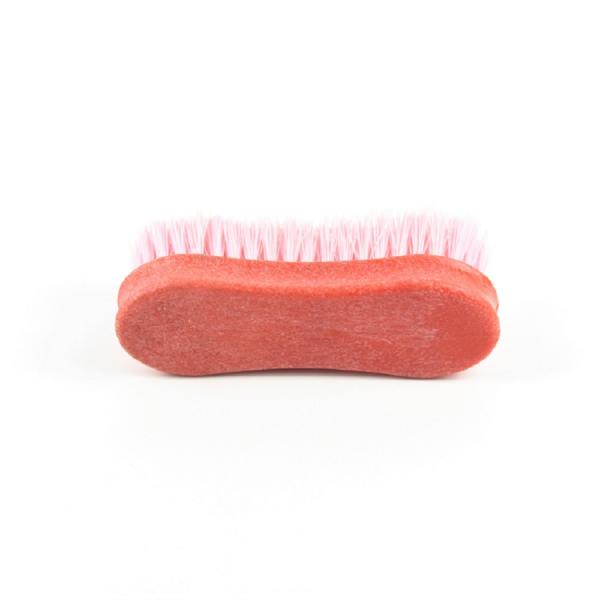 Plastic 5-inch horse grooming brush products in the shape of an 8
