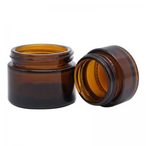 China 5g 20g 4oz 8oz Cosmetic Glass Jars Black Cap Amber Apothecary Jars wholesale