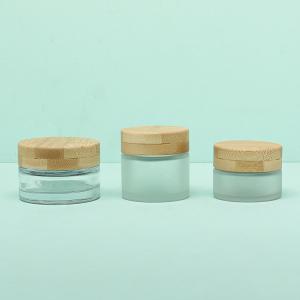 China Face Cream Packaging Glass Cosmetic Cream Jar 30g With Screw Bamboo Cap wholesale