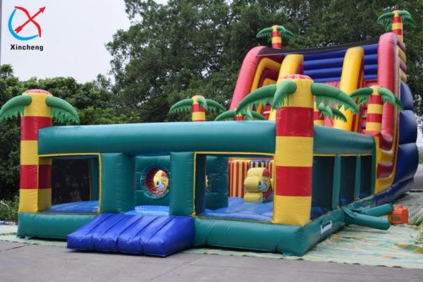 Quality Customized Giant Inflatable Palm Tree Slides Inflatable Bouncy Castle With Slides for sale