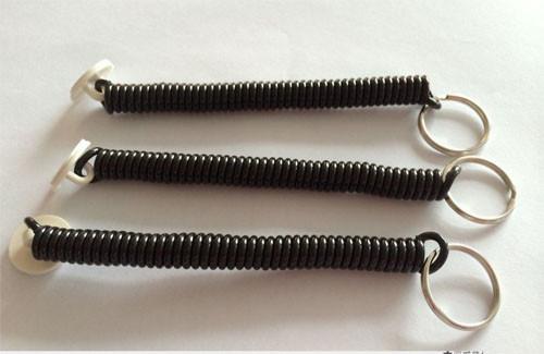 Quality Anchored Heavy Tool Tethers Black Spiral Leash Coil w/Adhesive Round Base and Split Key Ring for sale