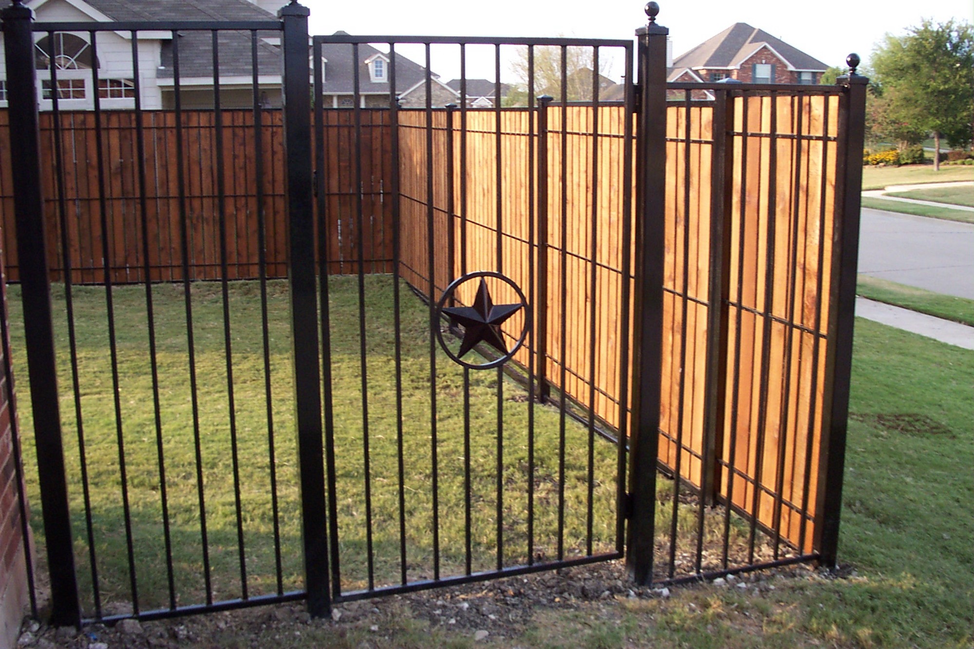 Sleek Tubular Steel Fence Enhances Curb Appeal
