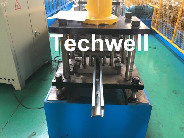 Quality PPGI , Galvanized Steel Guide Rail Roll Forming Machine With Disk Saw Cutting For Making Shutter Door Slats for sale