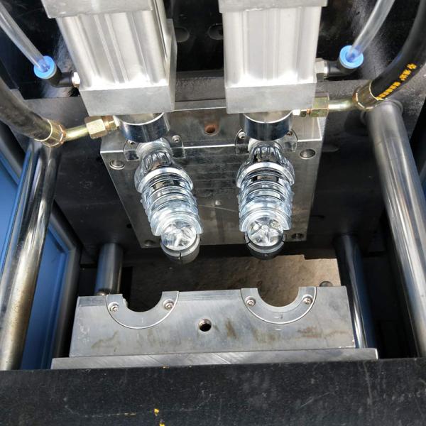 Semi-auto PET Juice/Water Bottle Blowing Machine Blow Molding Machine at 3910X2060X3190mm