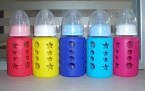 China 9oz glass baby milk feeding bottle 240ml with silicone sleeve and cover on sale