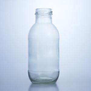 China 300ml Round Glass Milk Bottle with Lid Liquor Storage Solution Decal Surface Handling wholesale