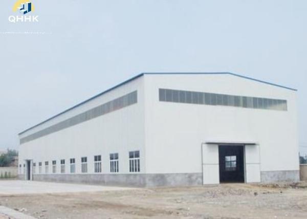 Quality Sliding Door Prefab Steel Frame House , Single Slope Prefab Metal Warehouse for sale