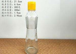 China 500ml Transparent Glass Bottle For Oil / Glass Vinegar Bottles With Spiral Lid wholesale