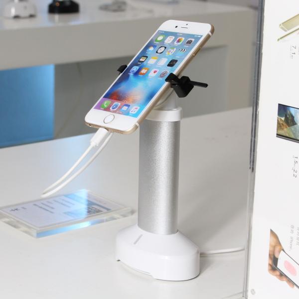 Quality Retail security display cell phone holder with alarm sensor and charging cord for phone shops for sale