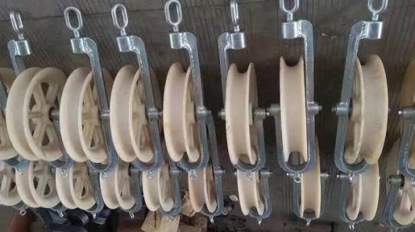 Quality Hold Down Pulley Block Anti Lifting Automatic Release Pulley for Pulling Rope for sale