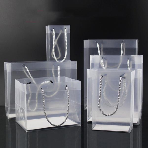 Custom logo printed wholesale gift transparent pp plastic handle bag for shopping