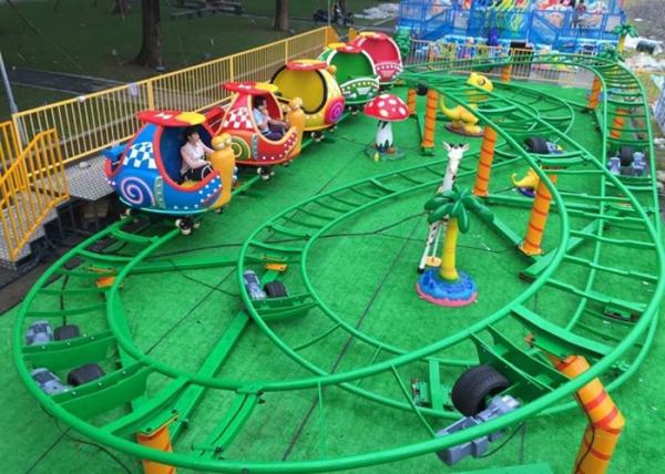 Quality Mini Snail Shape UFO Roller Coaster Customized Height With Chain Lift Structure for sale