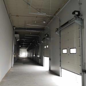 China Logistics Warehouse 1p Sectional Overhead Door Safety Electric Lifting Insulated wholesale