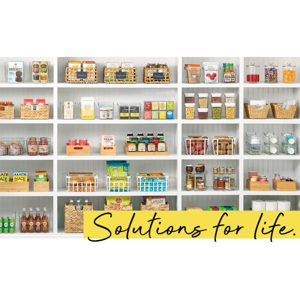 Solutions for Life Heading, antry setting, white shelves, bins, baskets holding organized food items