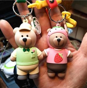 China Custom High Quality 3d Brown Bear Doll Keychain Key Holder With Silicone Wristband, Different Design Available wholesale