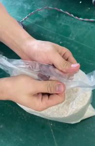 China 13BPM Double Chute Bag Sealing Machine With Vaccum Function wholesale