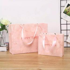 China Customized Logo 180gsm-500gsm Boutique Paper Bag With Handles wholesale